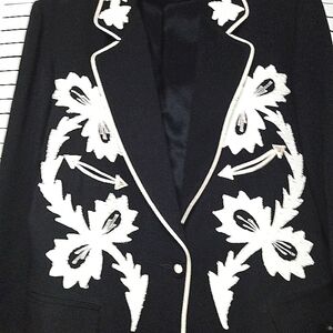 Outstanding Black women's jacket with distinctive design in white,size 6
